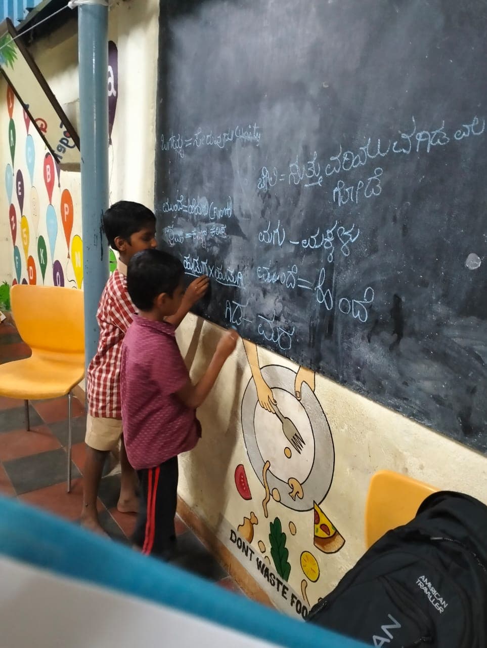 Children holding hands and laughing